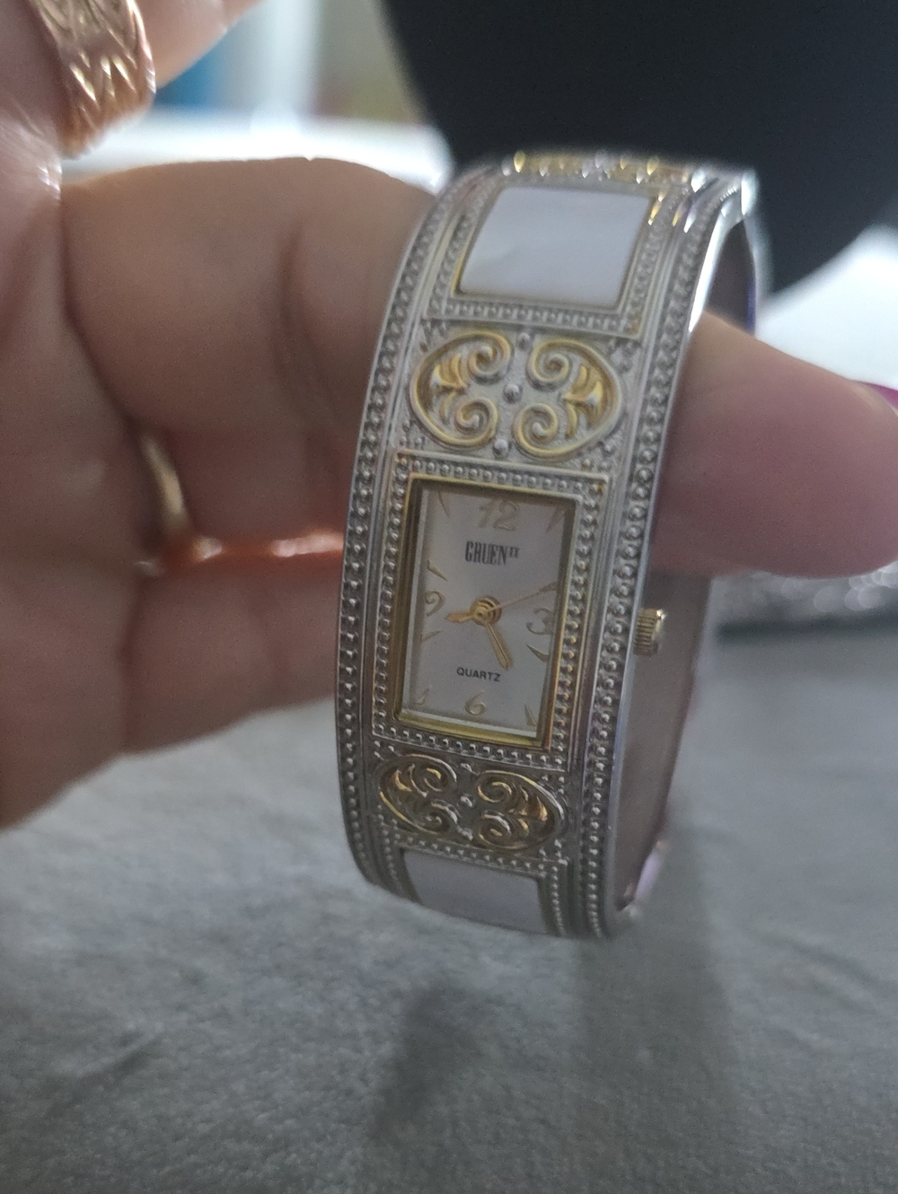 Vintage Two-Tone Silver and Gold Bangle Watch with White Accents
